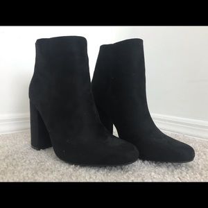 black high heeled suede boots
